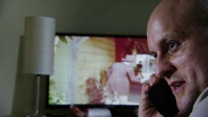 Stuart Highway holding his phone upside down