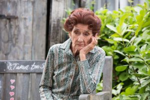 Dot Cotton smoking a fag