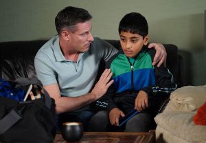 Dean as Robbie, and his on-screen son Sami (Credit: BBC)
