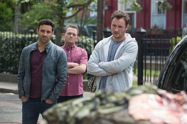 Martin and Kush watch Stacey and Kat fight in EastEnders