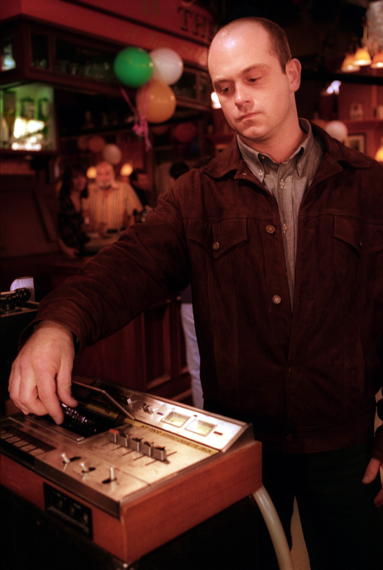 Grant Mitchell plays the infamous tape during Sharongate (Credit: BBC)