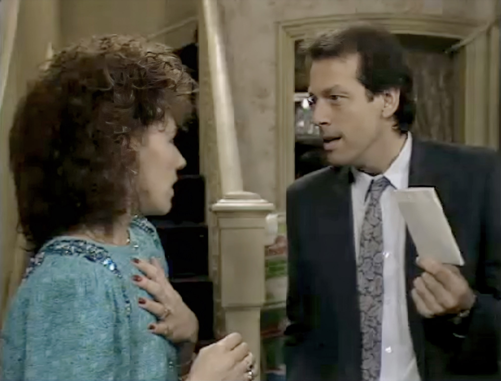 Den Watts hands Angie Watts divorce papers on Christmas Day (Credit: BBC)