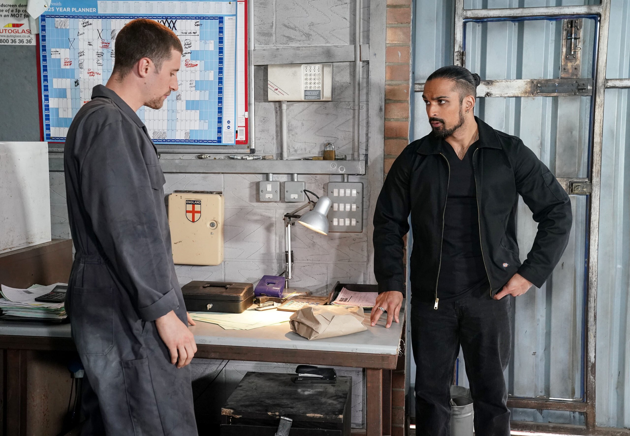 Ravi and Harry talk in the garage on EastEnders