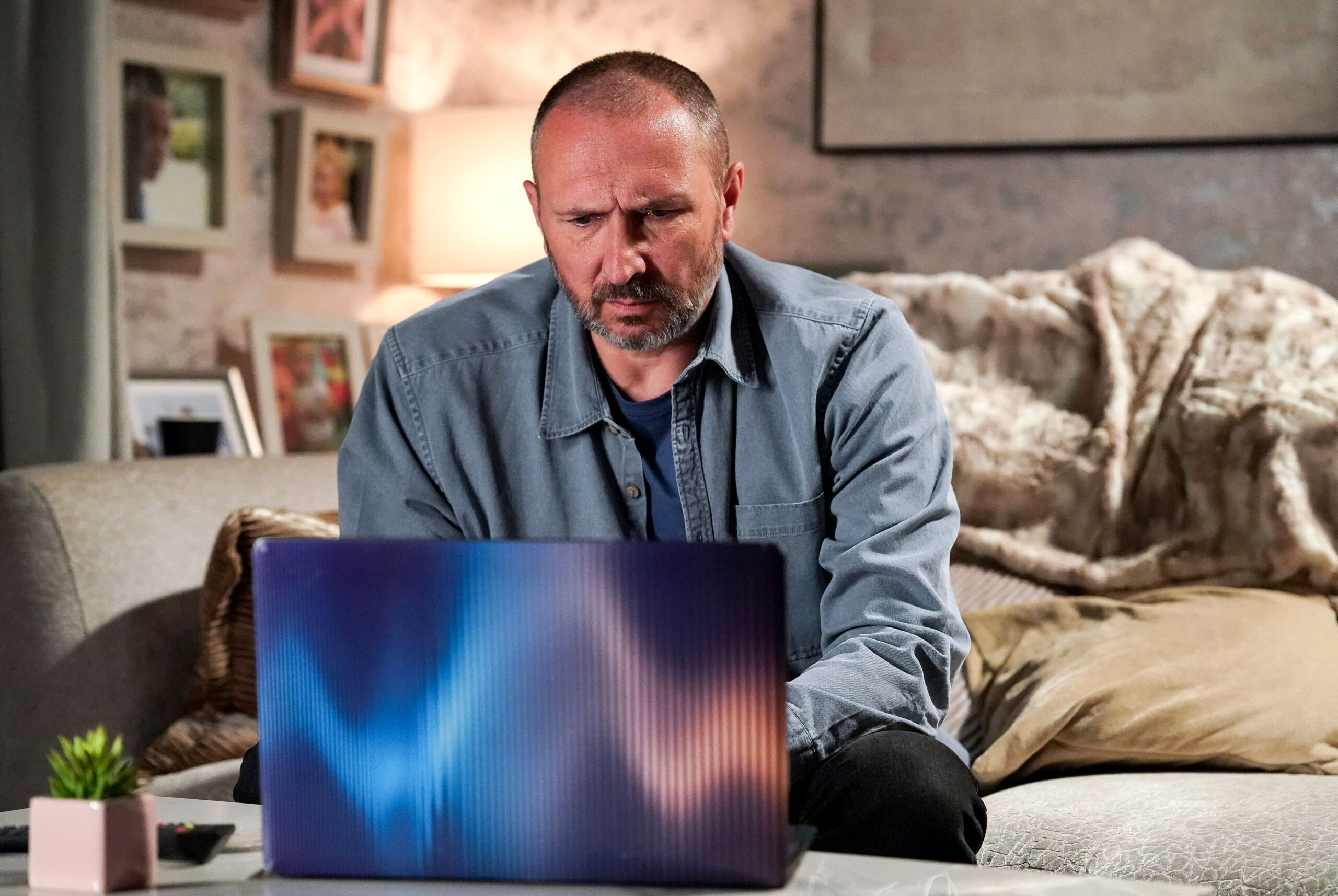 Ross looks disgusted by Joel's laptop on EastEnders