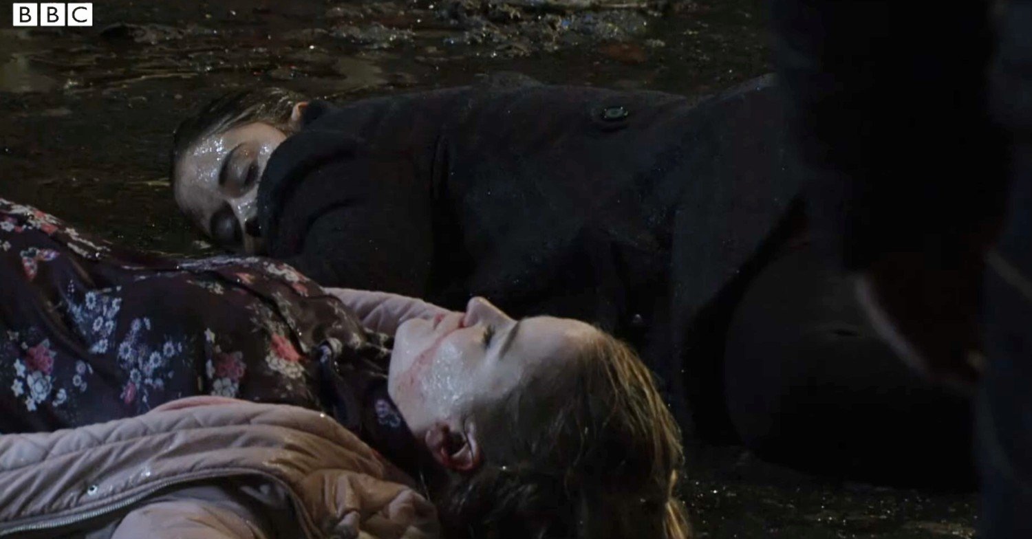 Abi and Lauren unconscious in the street