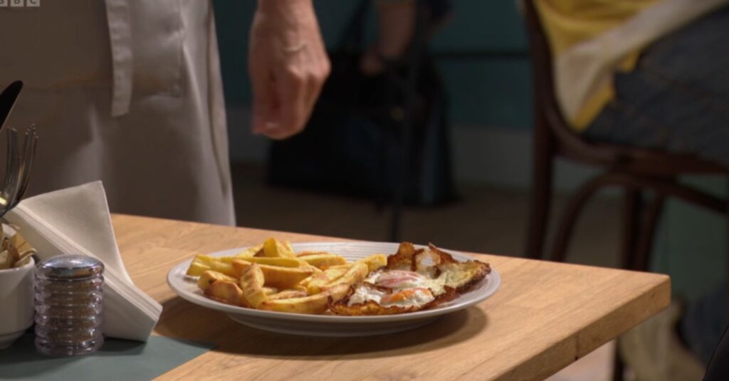 A burned plate of eggs and chips on EastEnders