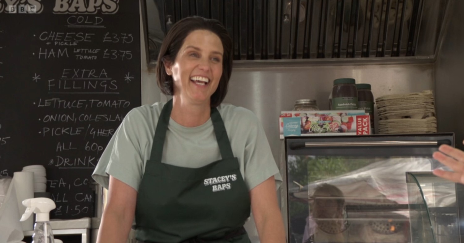 Eve looks happy as she talks to Peter