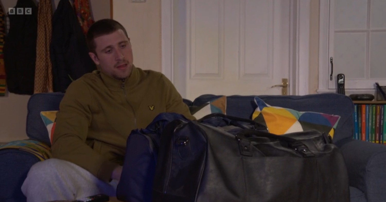 Harry looks at Ravi's bags of drugs on EastEnders tonight
