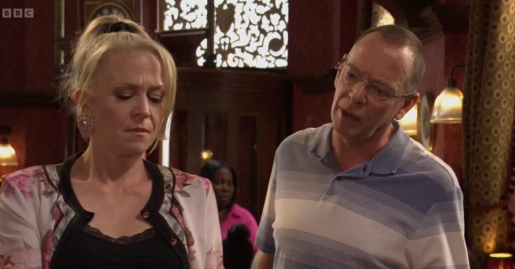 Ian and Linda inspect Stacey's scratch card on EastEnders
