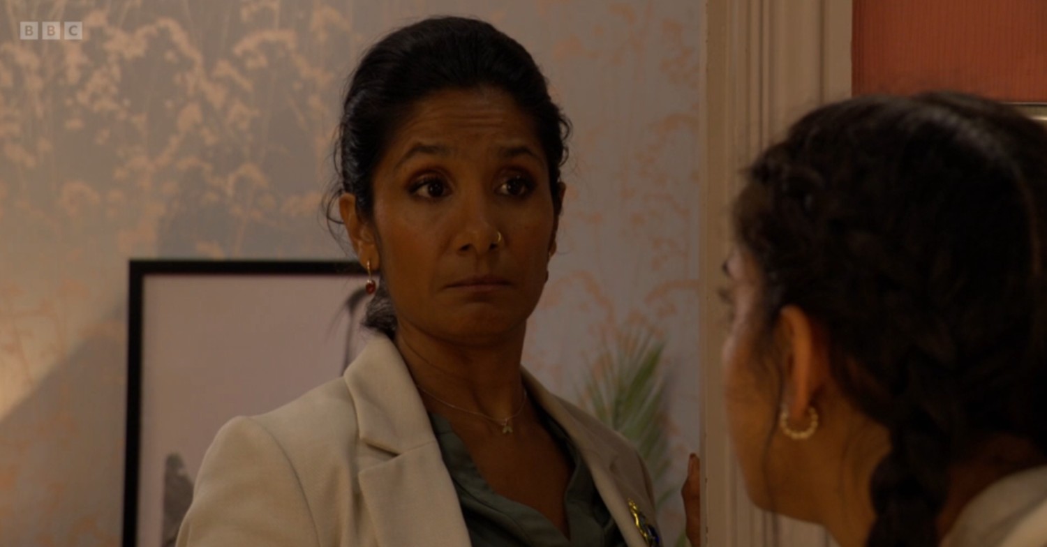 Suki looks at Avani thoughtfully on EastEnders