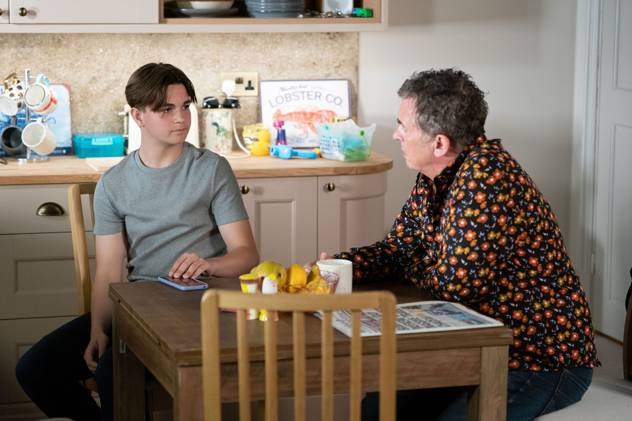 Tommy and Alfie share a tense conversation at home