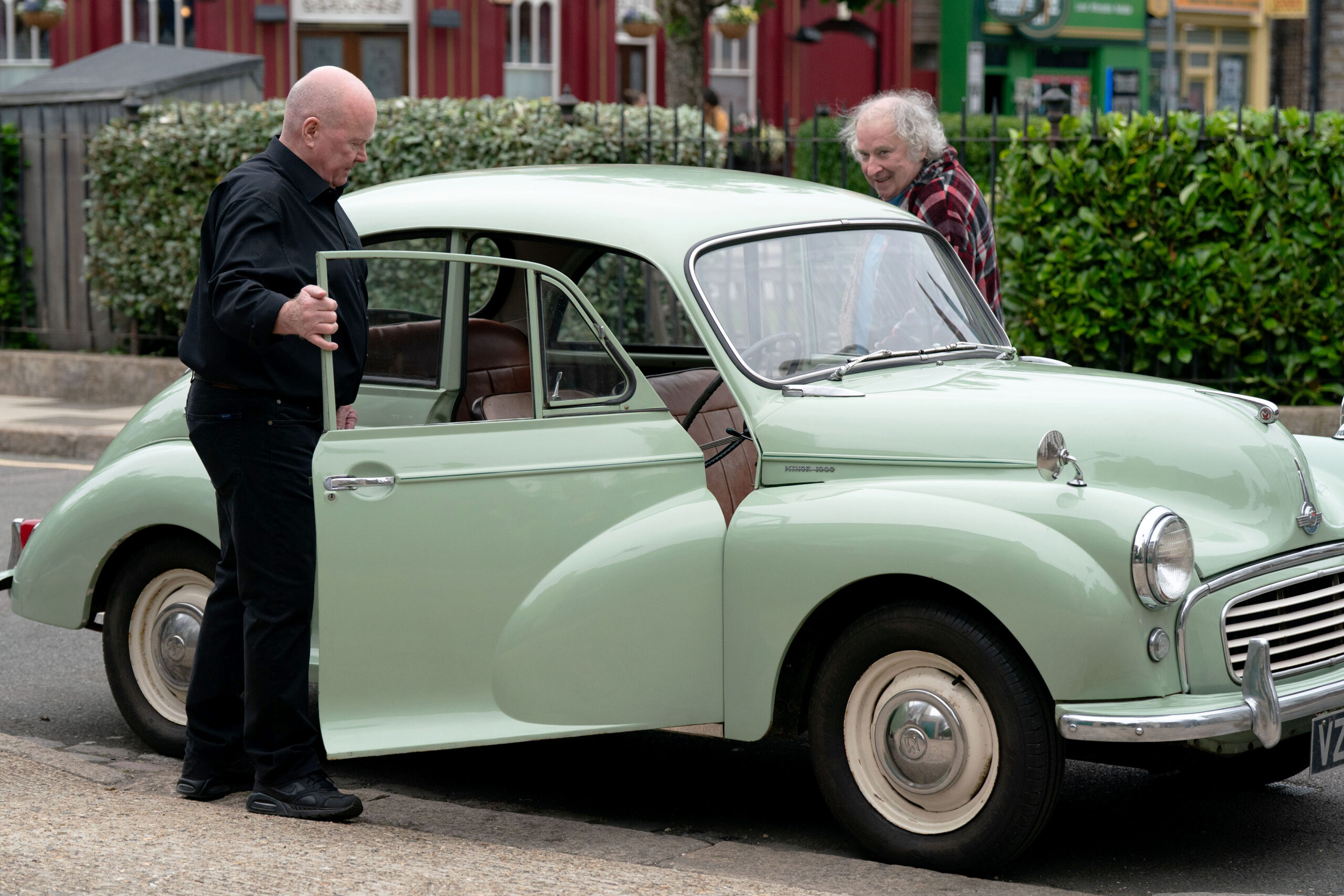 Phil and Nigel get into his car