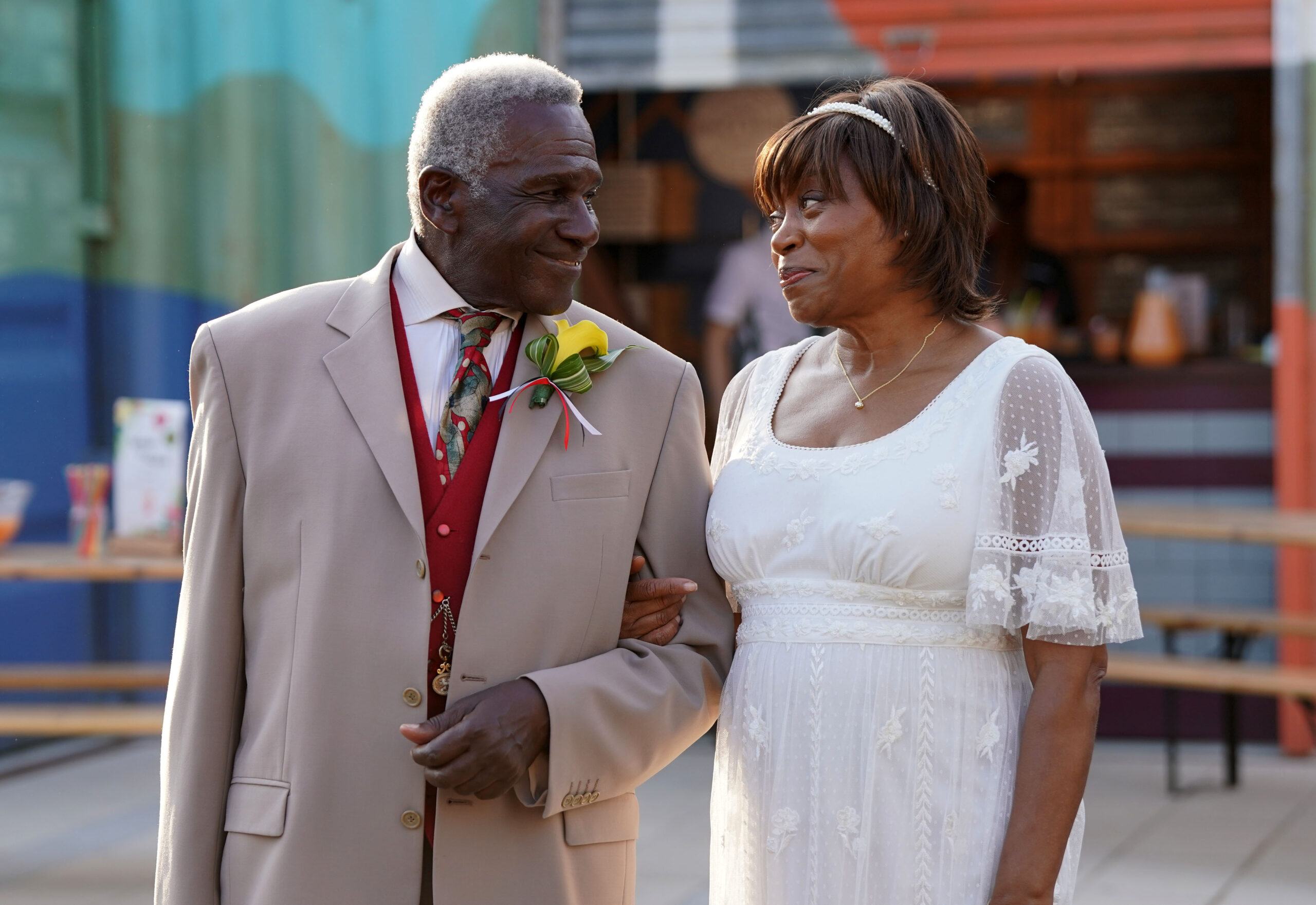 Patrick and Yolande looking loved up on their wedding day