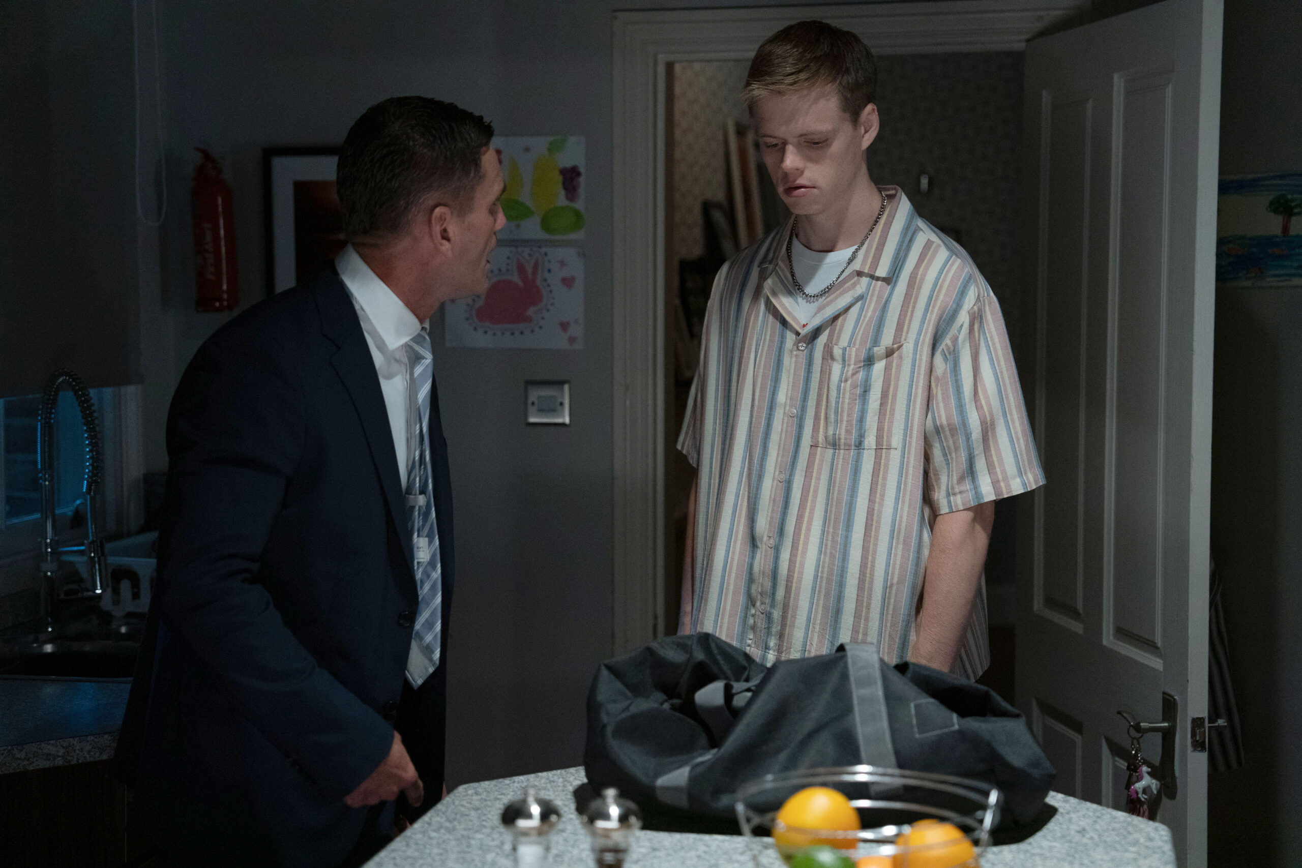 Oscar has discovered Ravi's gun in EastEnders