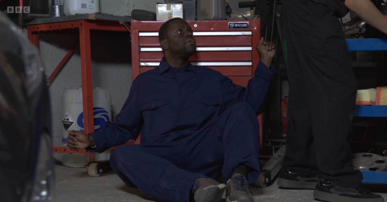 Kojo on the floor in The Arches looking scared