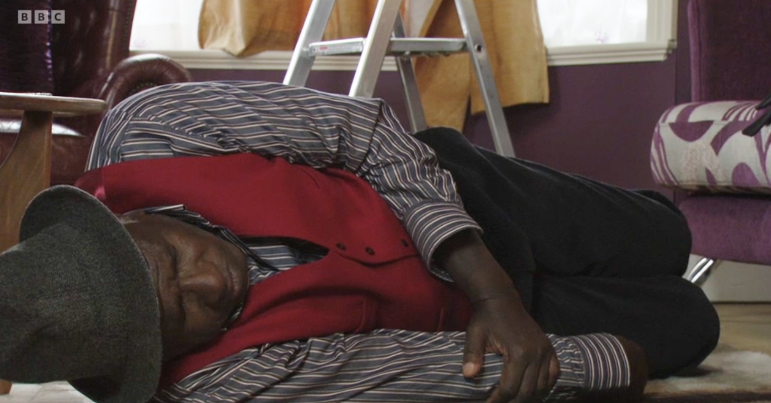Patrick on the floor after falling off a ladder 