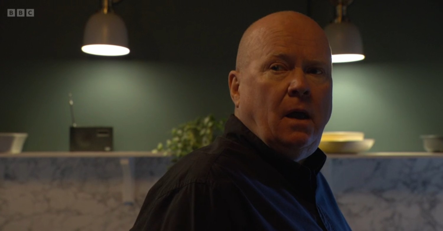Phil looks angry on EastEnders