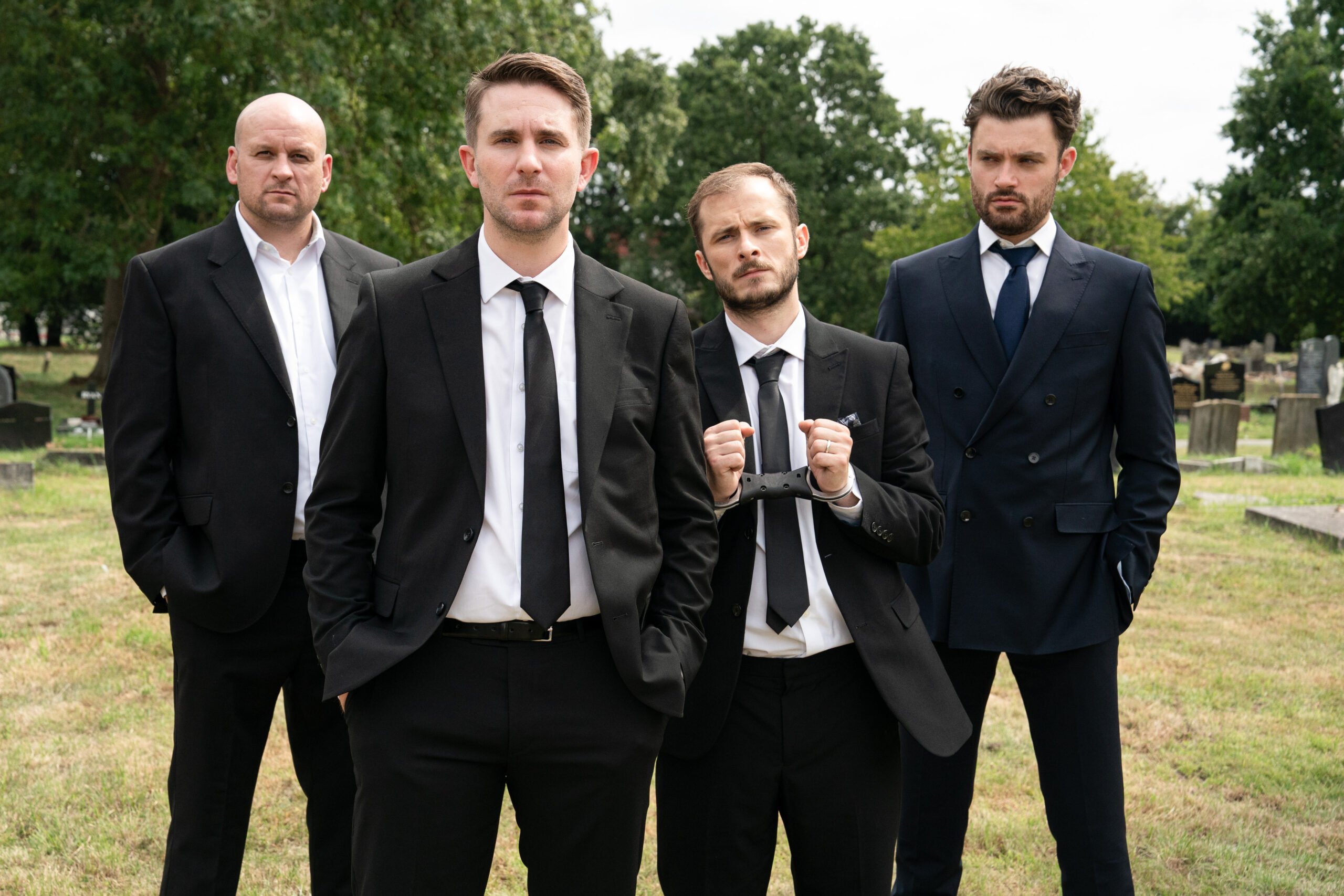 Stuart, Callum, Ben and Johnny at a funeral