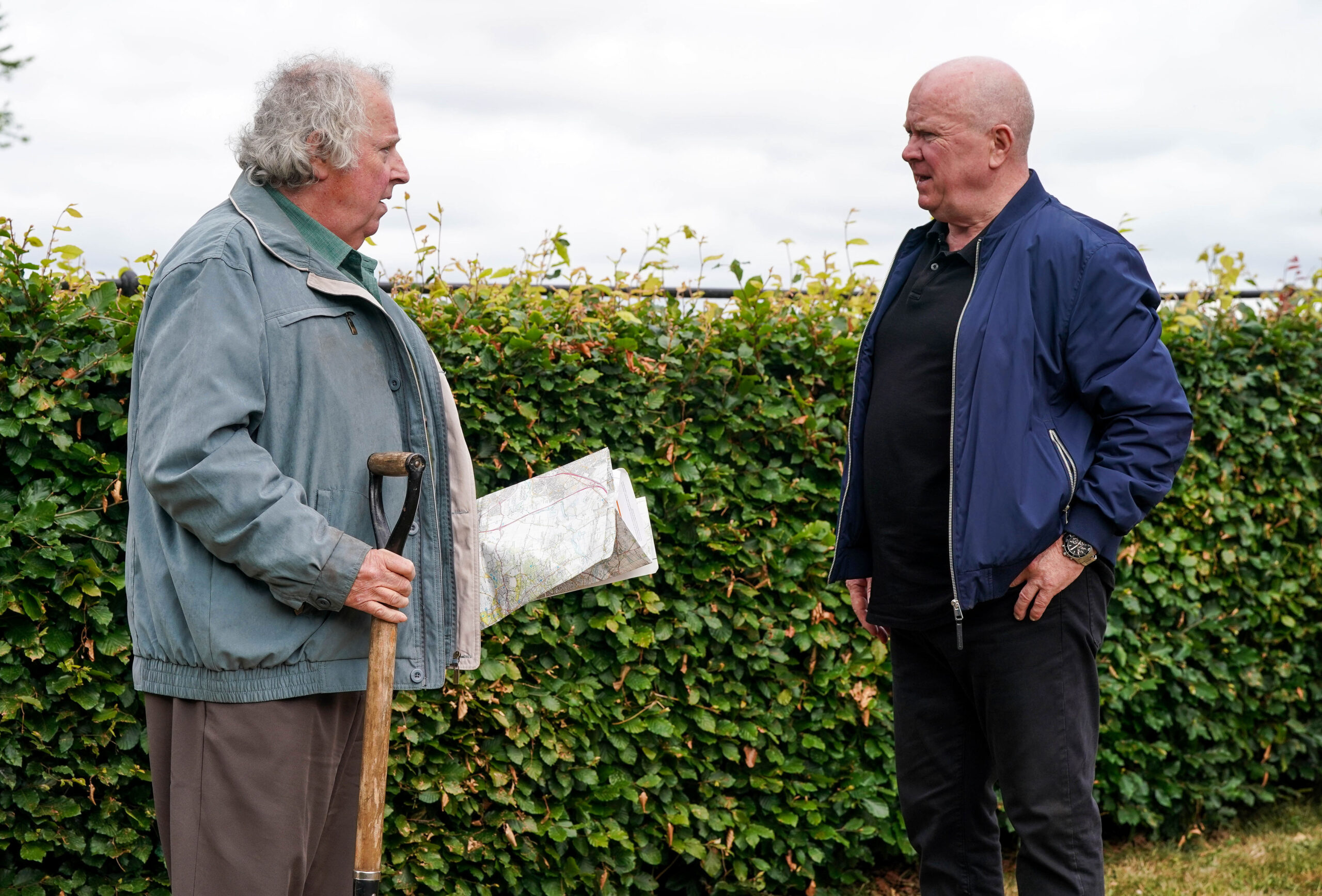 Nigel and Phil talk in the countryside