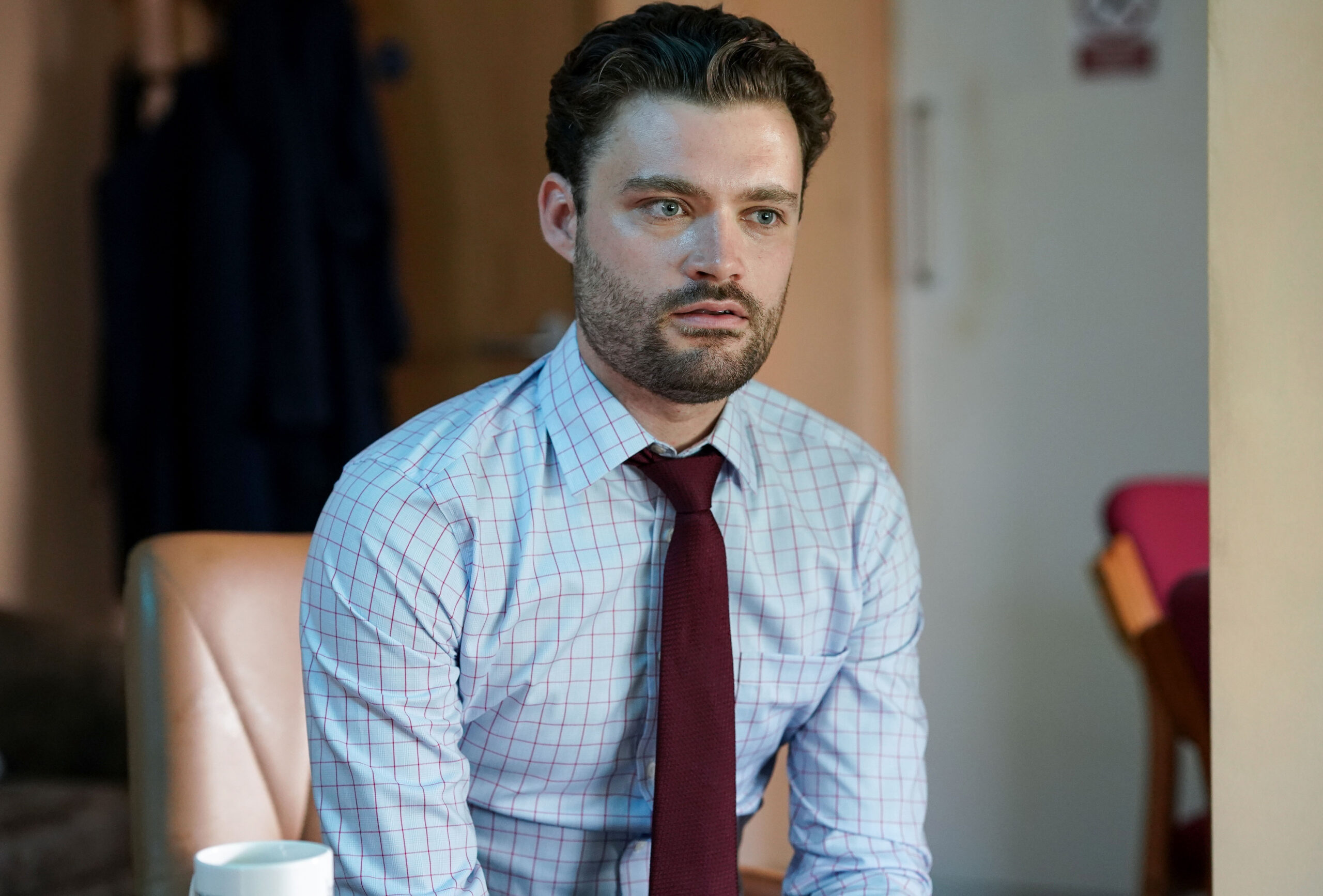 Johnny looks anxious in EastEnders