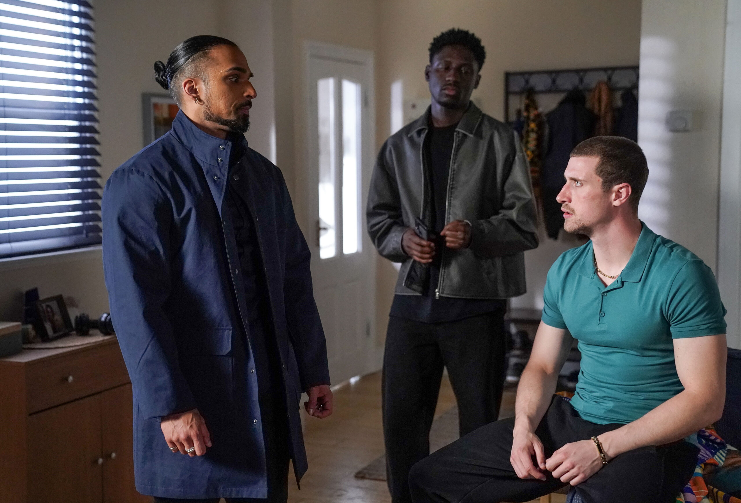 Ravi, Okie and Harry have a covert meeting at Kojo's flat