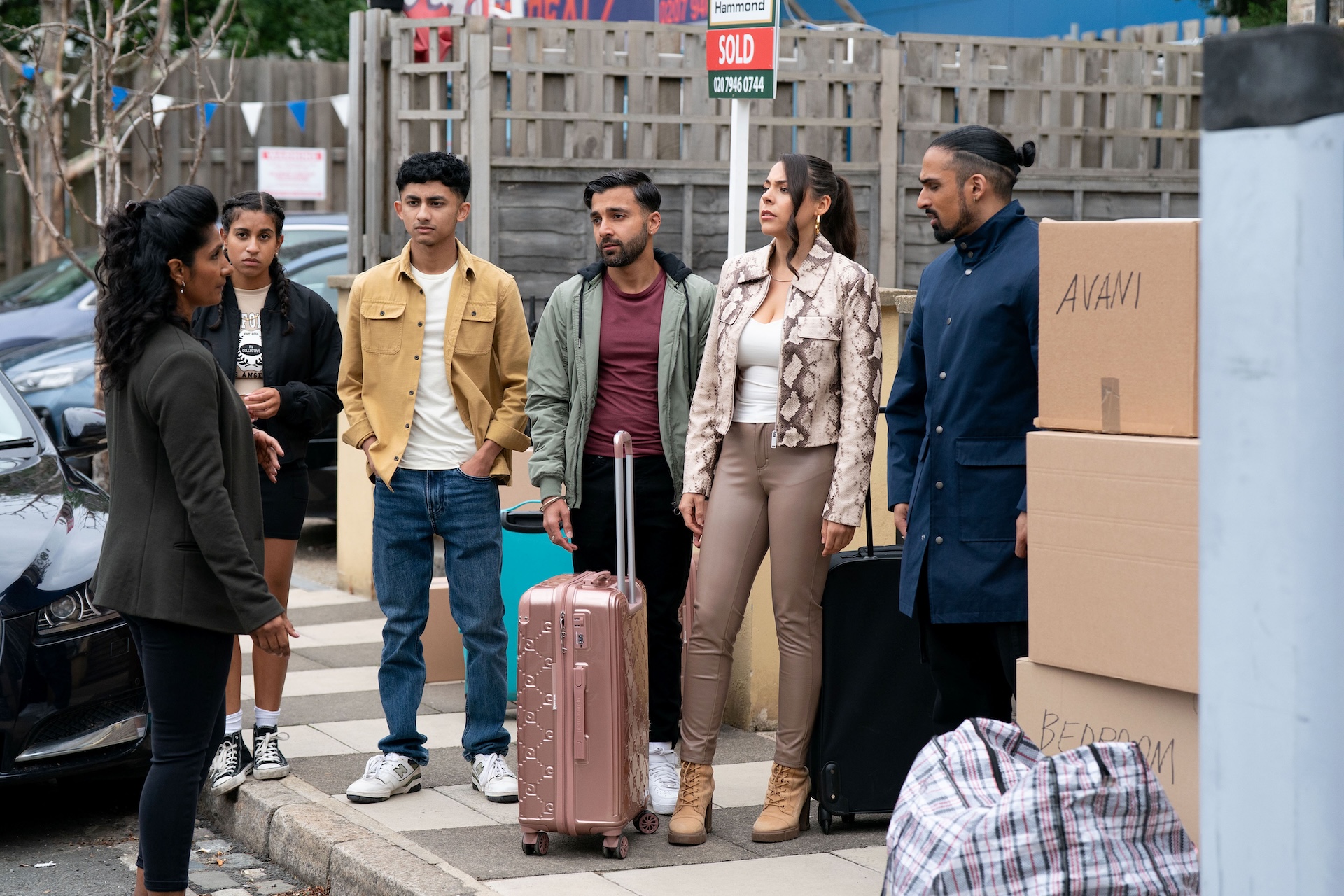 Suki's family move back in