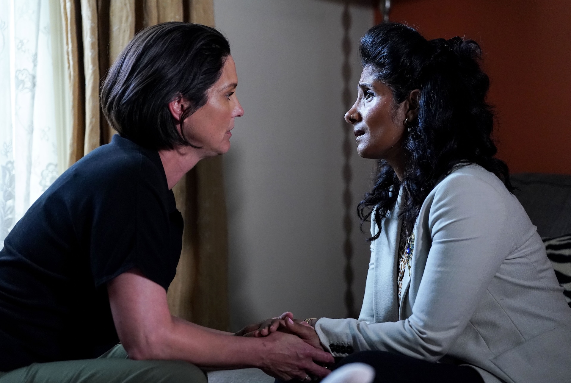 Eve holds hands with Suki in EastEnders