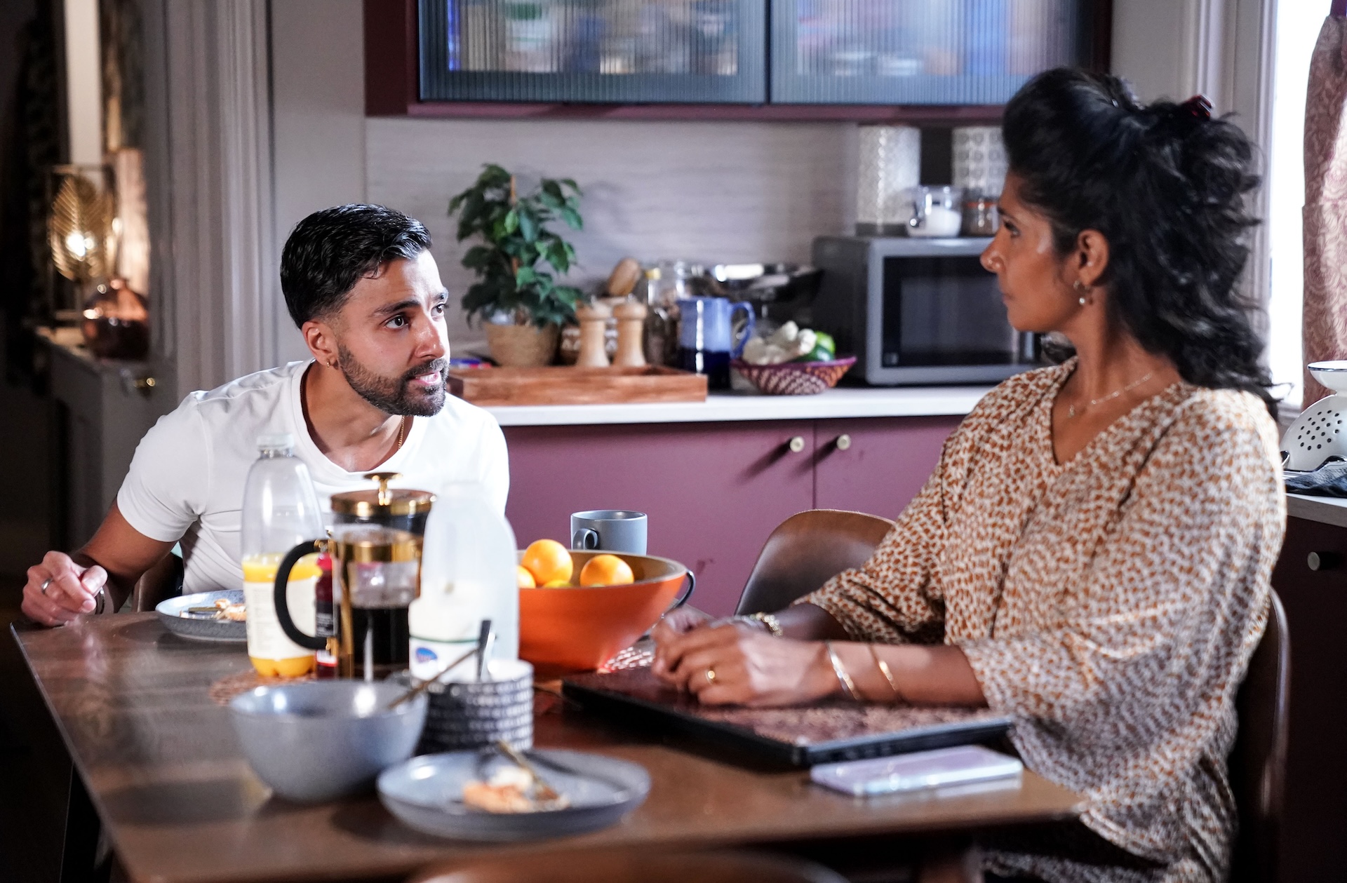 Vinny speaks to Suki in the kitchen