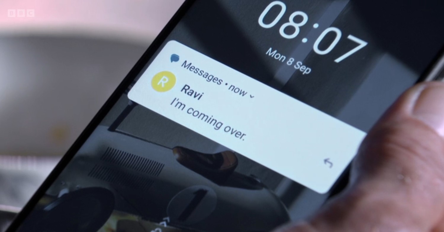 Jack checks his phone on EastEnders