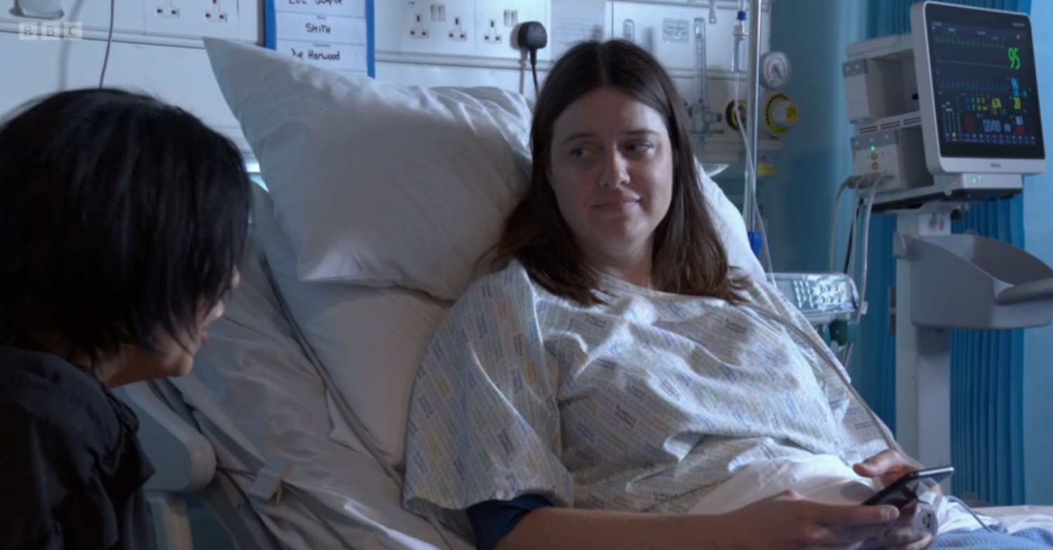 Zoe talking to Kat in the hospital