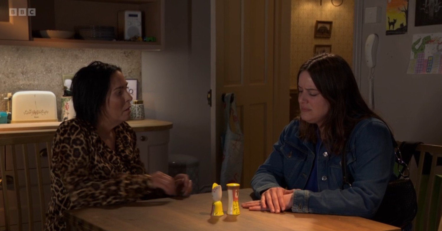 Zoe and Kat at the table on EastEnders tonight