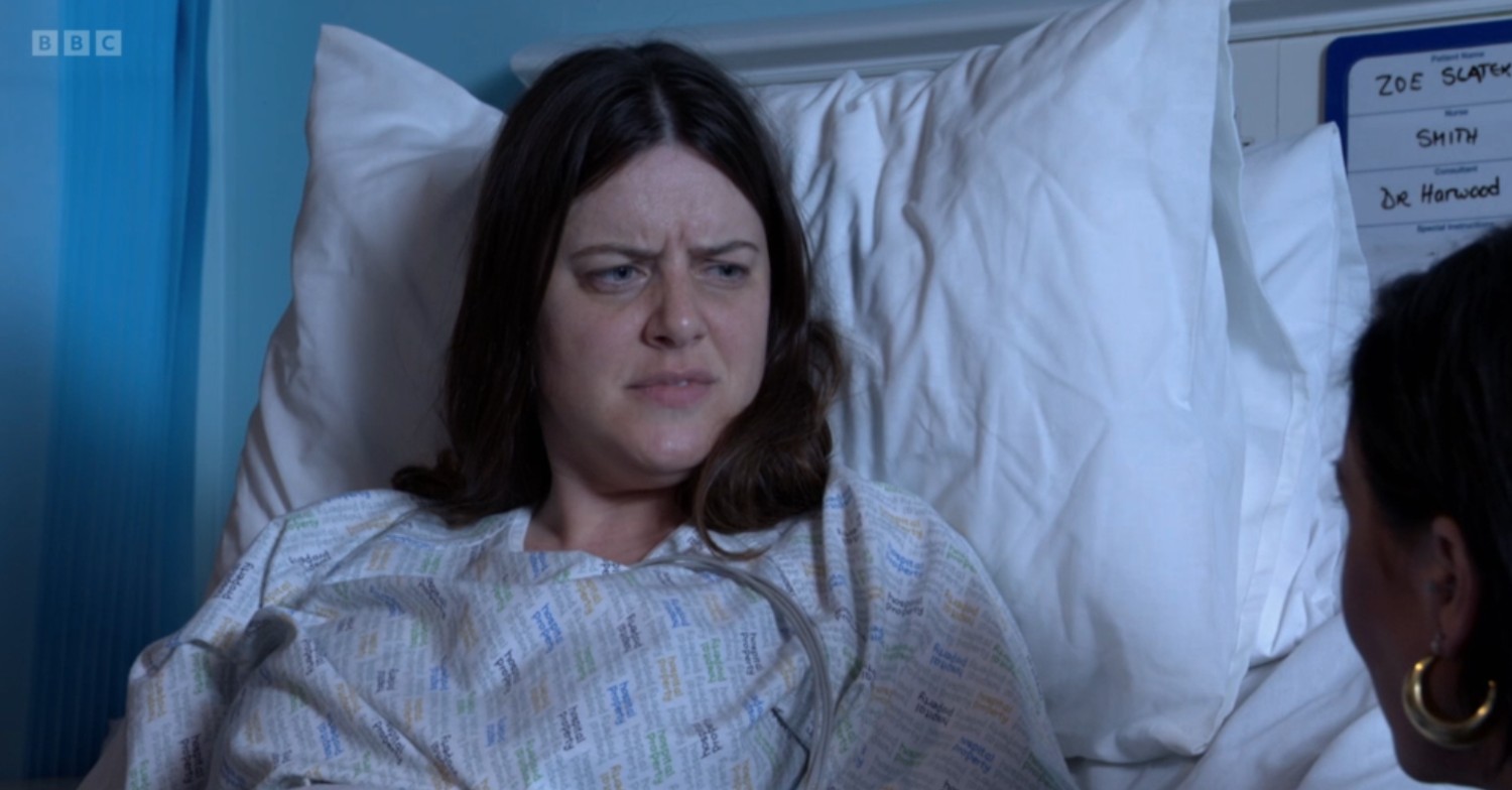 Zoe in hospital, looking disgusted 