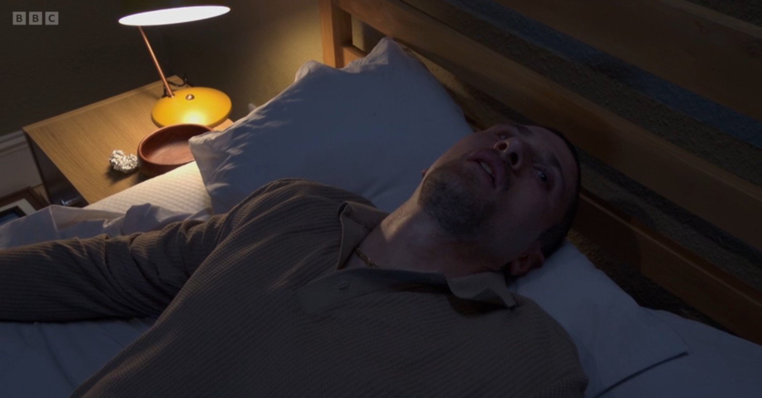 Harry lies back on his bed, all drugged-up