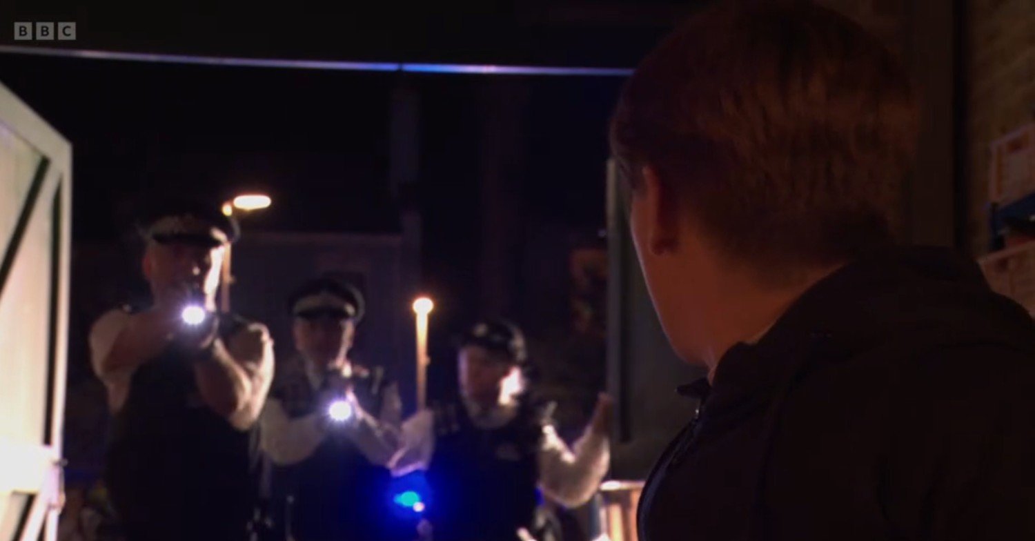 The police corner Joel in the Slaters' garage on EastEnders
