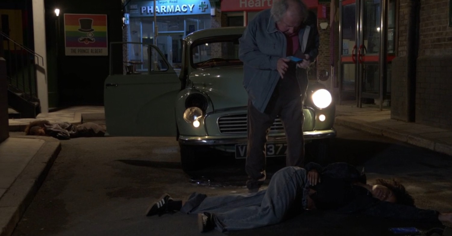 Nigel looks over an unconscious Jasmine on EastEnders 