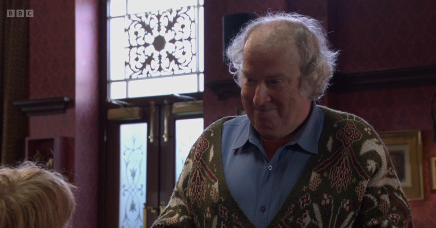 Nigel smiling as he talks to Julie
