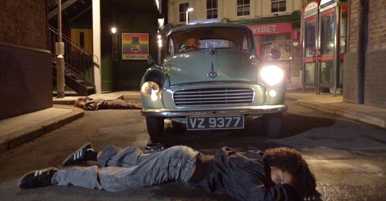 Nigel's car in front of an unconscious Jasmine on EastEnders
