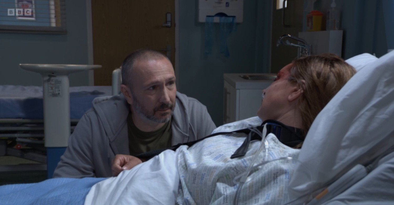 Ross at Vicki's side in the hospital on EastEnders 