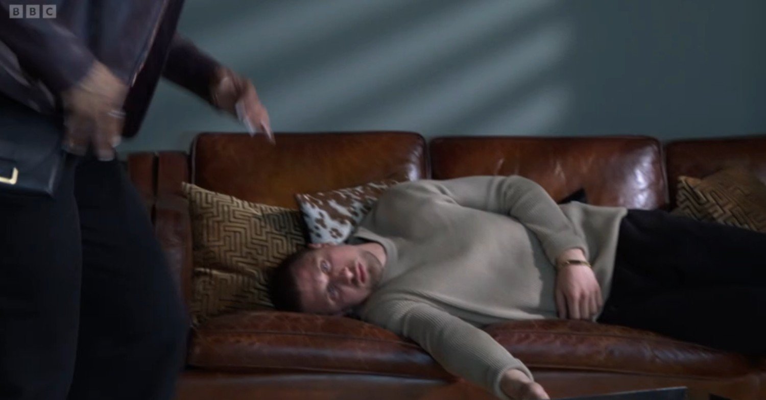 Harry passed out on the sofa