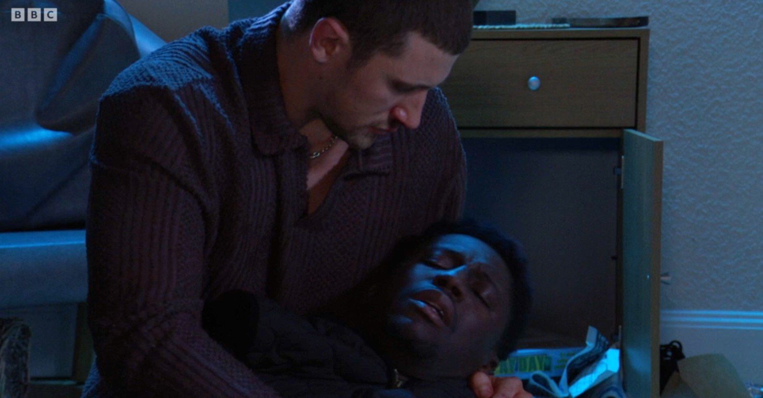 Harry cradles Okie's dying body