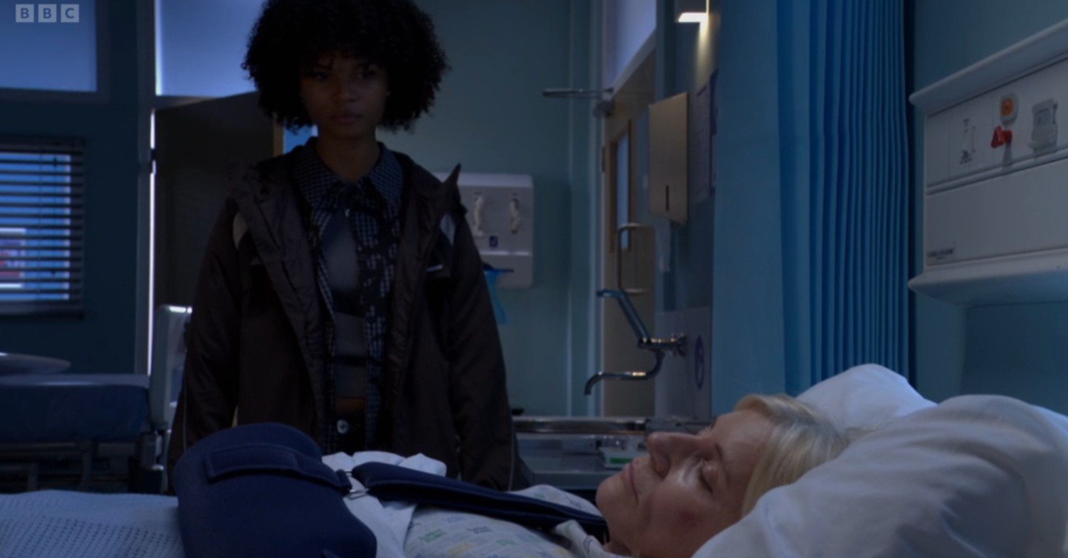 Jasmine stands over Cindy's unconscious body in hospital (Credit: BBC/Composite: EI)