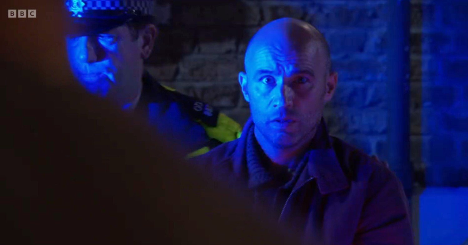 Teddy with the police on EastEnders