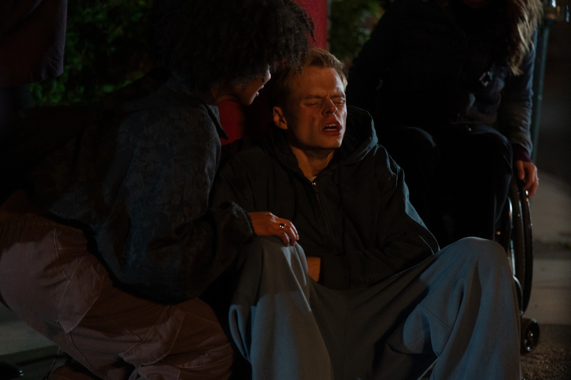 Jasmine with Oscar outside the burning house