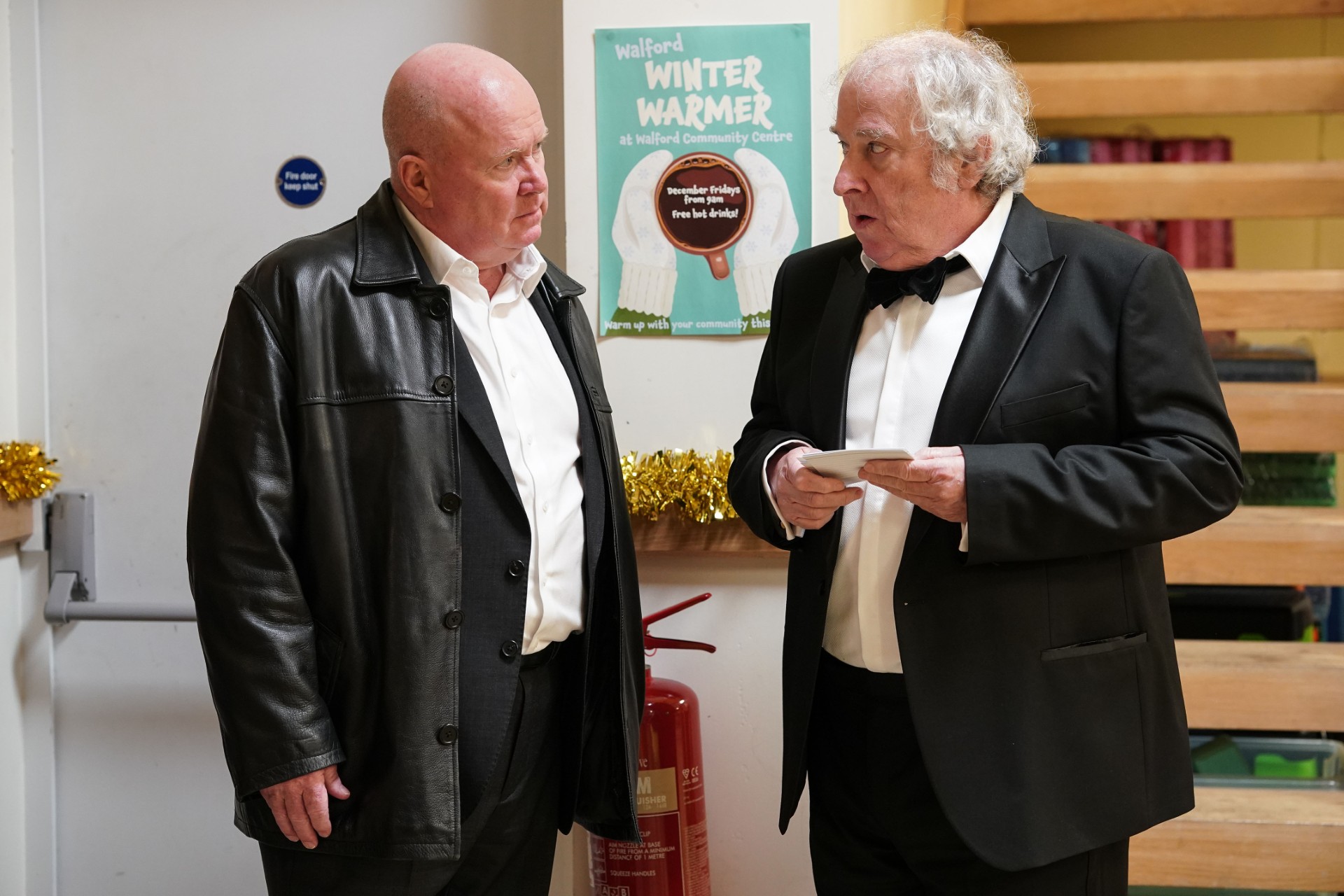 Nigel talks nervously to Phil on EastEnders