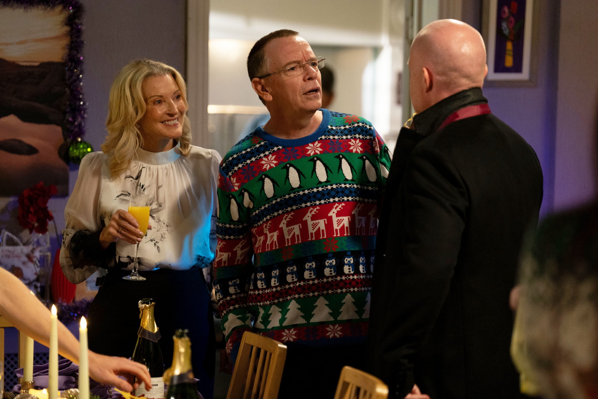 Ian wears a Christmas jumper as he and Kathy talk to Max on EastEnders
