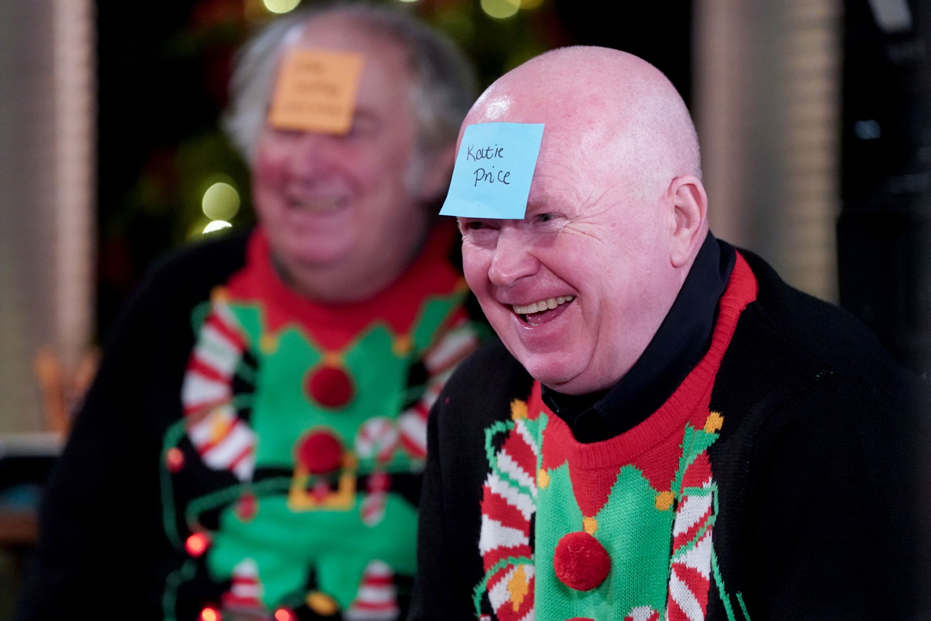 Phil and Nigel laugh as they celebrate Christmas