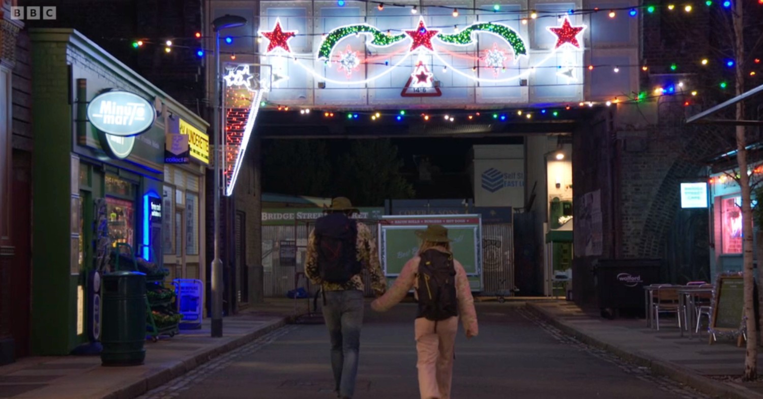 Freddie and Anna walk out of Walford together, hand in hand