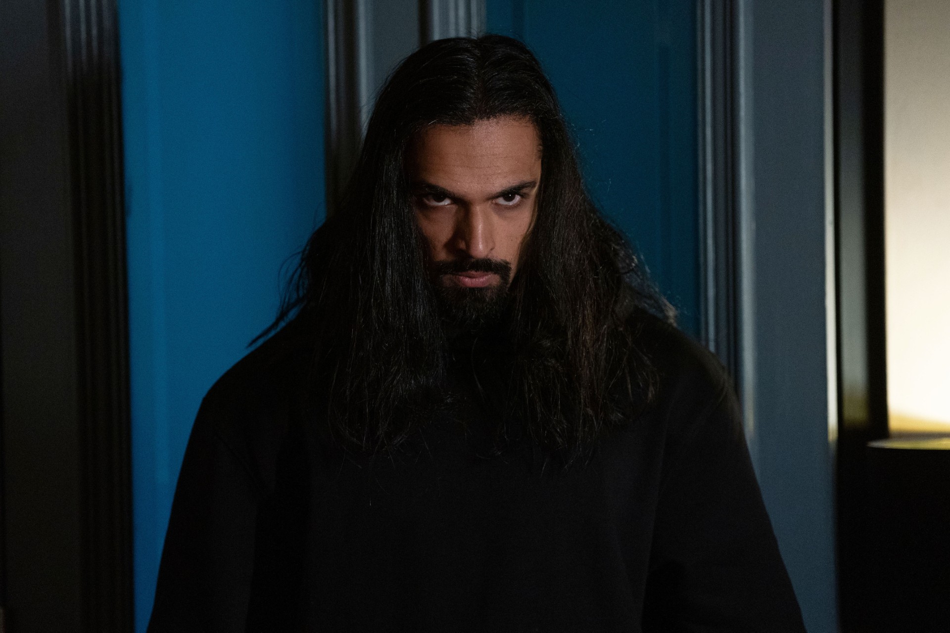 Ravi looking worried with his hair down