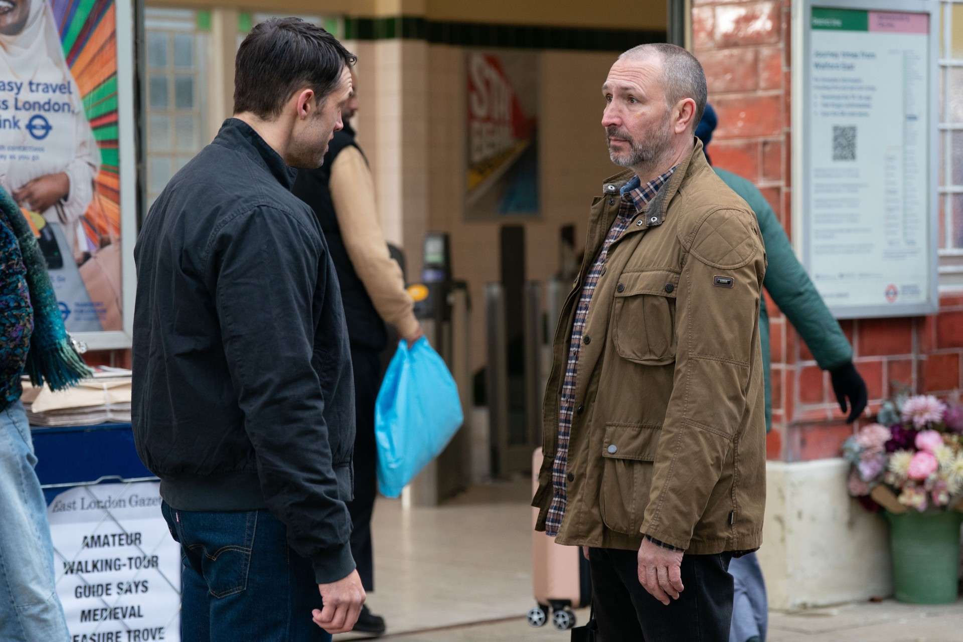 Ross and Mark talking outside the tube station