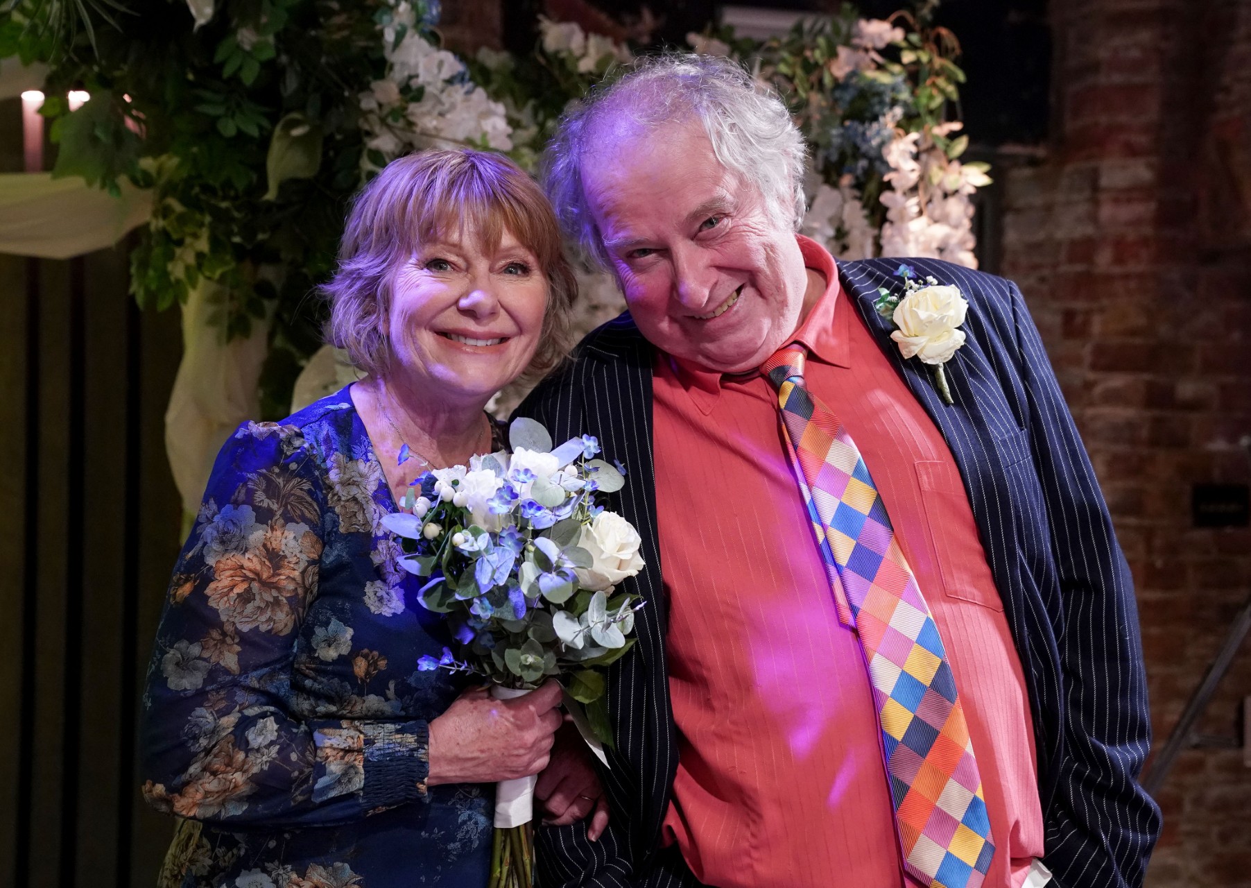 Nigel and Julie smiling on EastEnders